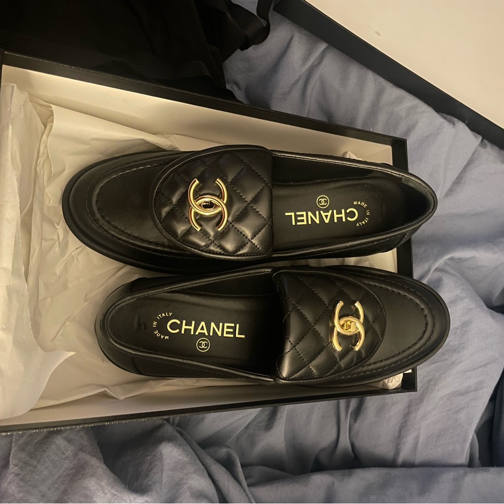 CHANEL turnlock loafers